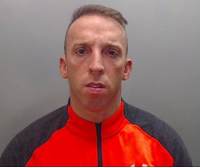 Reward for whereabouts of man wanted for firearms & drug offences